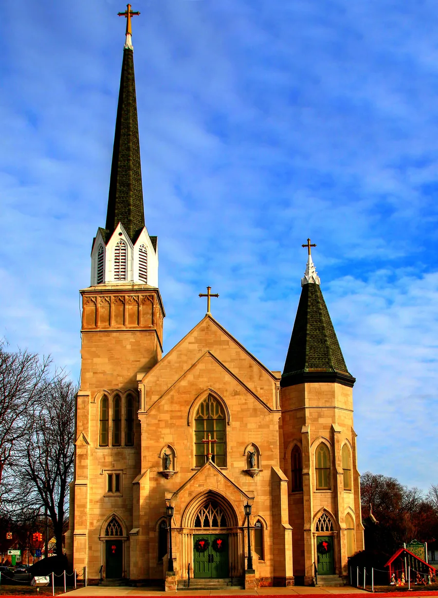 Historic church exterior with three steeples